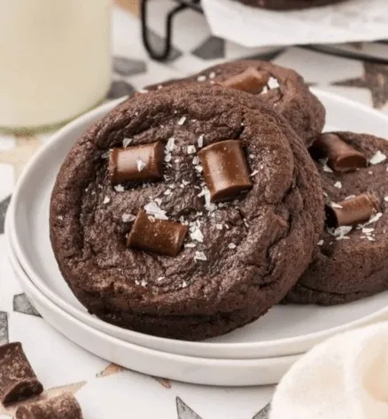 Fresh homemade double chocolate cookie in Lahore, topped with large chocolate pieces and sea salt flakes.